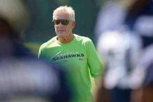 Seattle Seahawks head coach Pete Carroll watches NFL football practice Saturday, July 30, 2022, in Renton, Wash. (AP Photo/Ted S. Warren)