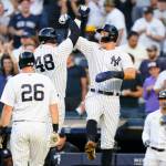 New York Yankees Anthony Rizzo (48) celebrates with Aaron Judge after Rizzo hit a three-run home run during the first inning of a game against the Seattle Mariners on Monday in New York. (AP Photo/Frank Franklin II)