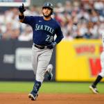 Seattle Mariners' Eugenio Suarez (28) gestures to fans as he runs the bases after hitting a two-run home run during the first inning of a baseball game against the New York Yankees Tuesday, Aug. 2, 2022, in New York. (AP Photo/Frank Franklin II)