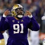 Washingtons Tuli Letuligasenoa reacts after a play against California on Sept. 25, 2021, in Seattle. (AP Photo/Elaine Thompson)