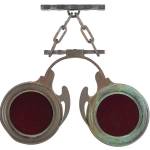 Antique trade signs are especially desirable when they double as folk art. This optician's sign, shaped like a pair of red lenses in a metal frame, could be an interesting, if expensive, decoration.