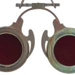 Antique trade signs are especially desirable when they double as folk art. This optician's sign, shaped like a pair of red lenses in a metal frame, could be an interesting, if expensive, decoration.