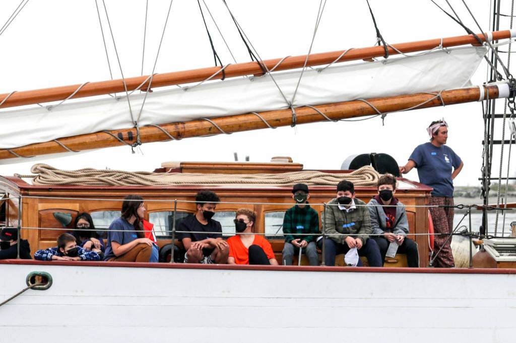 Members of Casino Connect are underway Tuesday morning aboard the Adventuress in Everett. The teens will go on a four-day sailing trip where they learn about maritime skills and environmental science. (Kevin Clark / The Herald)