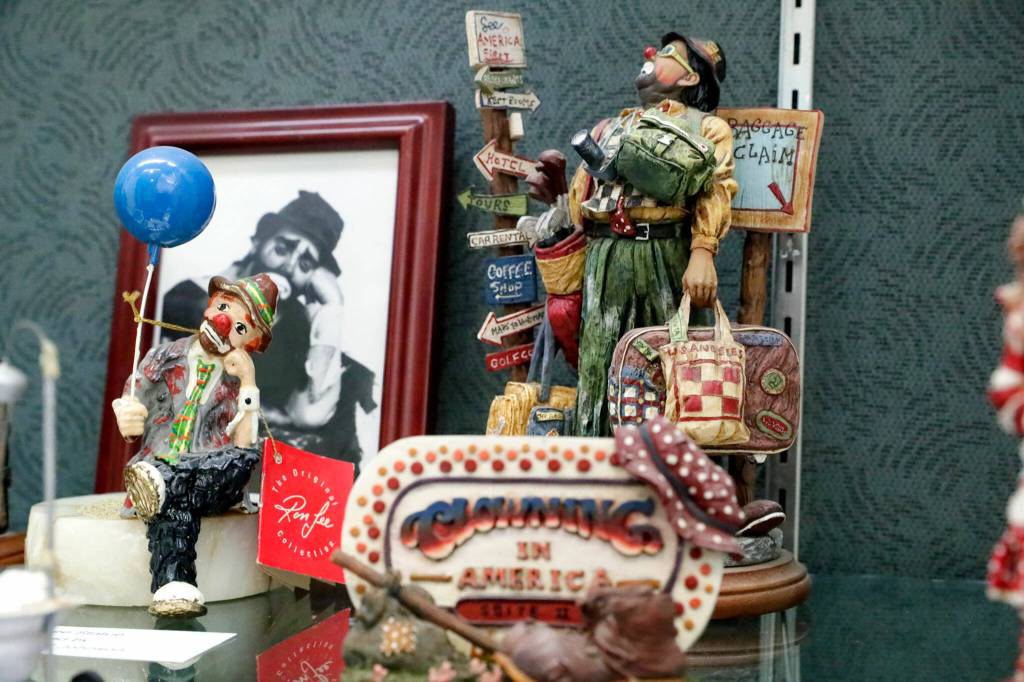 Figurines make up the history of clowns exhibit by Bruce Johnson the Lynnwood Library on Thursday in Lynnwood. (Kevin Clark / The Herald)