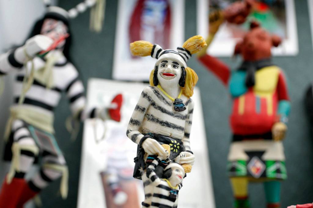 Figurines make up the history of clowns exhibit by Bruce Johnson the Lynnwood Library on Thursday in Lynnwood. (Kevin Clark / The Herald)