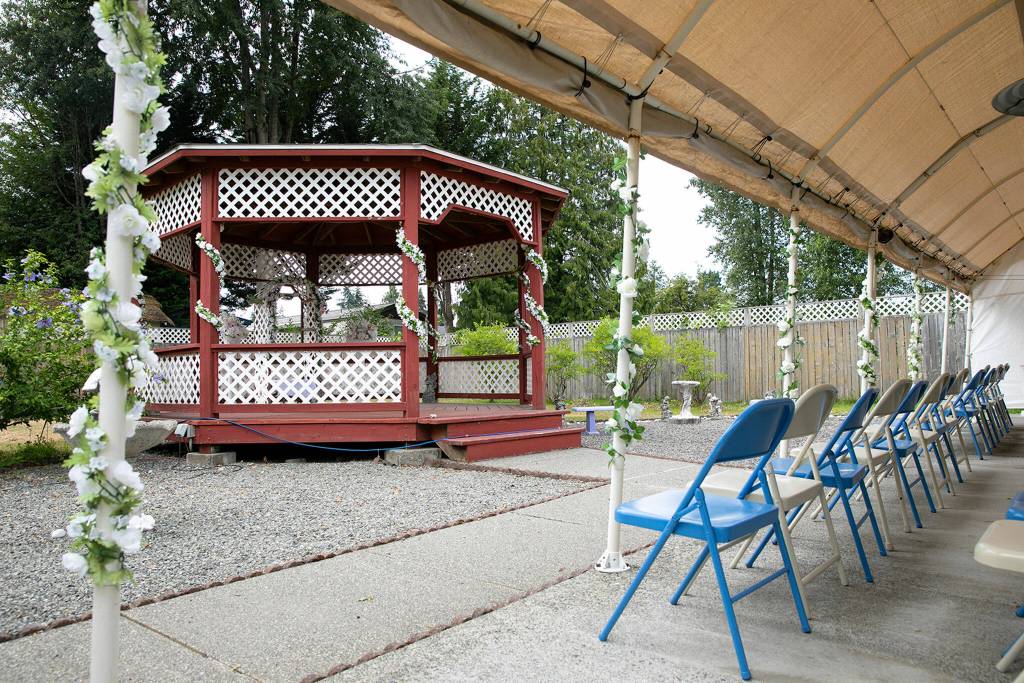 A gazebo built by one of Barbara Rasberrys sons is for outdoor nuptials at the Purple Wedding Chapel. (Ryan Berry / The Herald)