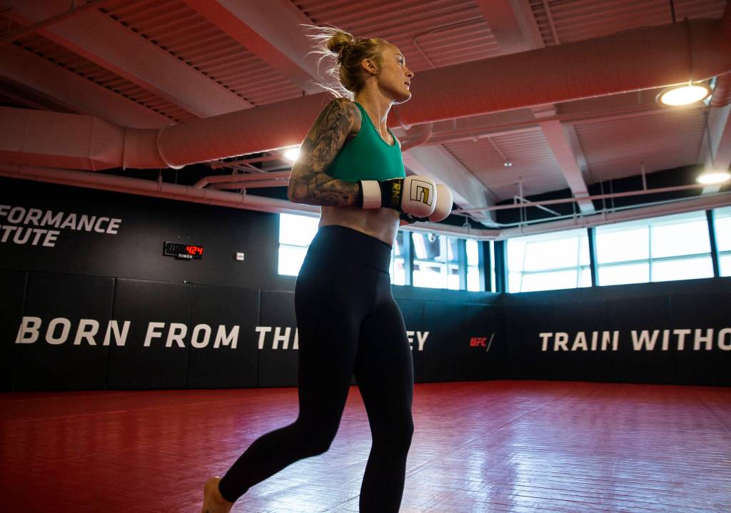 Miranda Granger runs a lap around the training area at the UFC Performance Institute after a successful weigh-in earlier in the morning on Friday, Aug. 5, 2022, in Las Vegas. After making weight, Granger was finally able to eat and drink water normally again, before heading into one of her final workouts ahead of her fight the following day. (Olivia Vanni / The Herald)