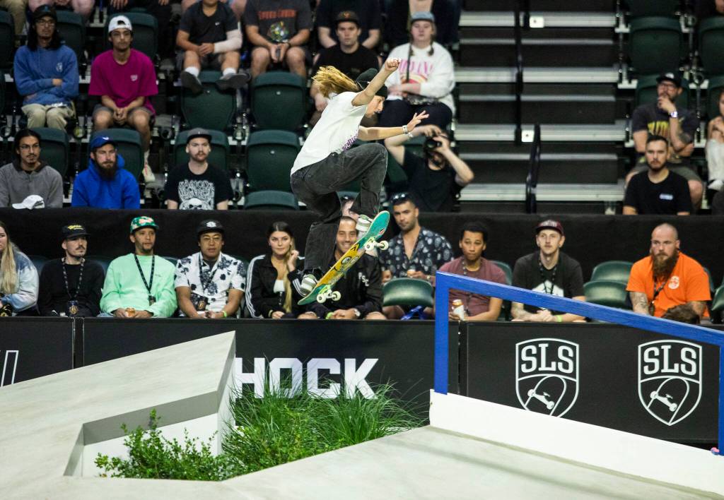 Poe Pinson of the United States jumps across a gap to grind one of the rails on the course during the Street League Skateboarding womens final on Sunday, Aug. 14, 2022 in Everett, Washington. (Olivia Vanni / The Herald)