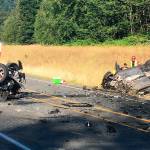Two vehicles rolled over and three people suffered injuries Saturday in what’s believed to be a DUI crash on Highway 522. (Snohomish County Fire District 7)