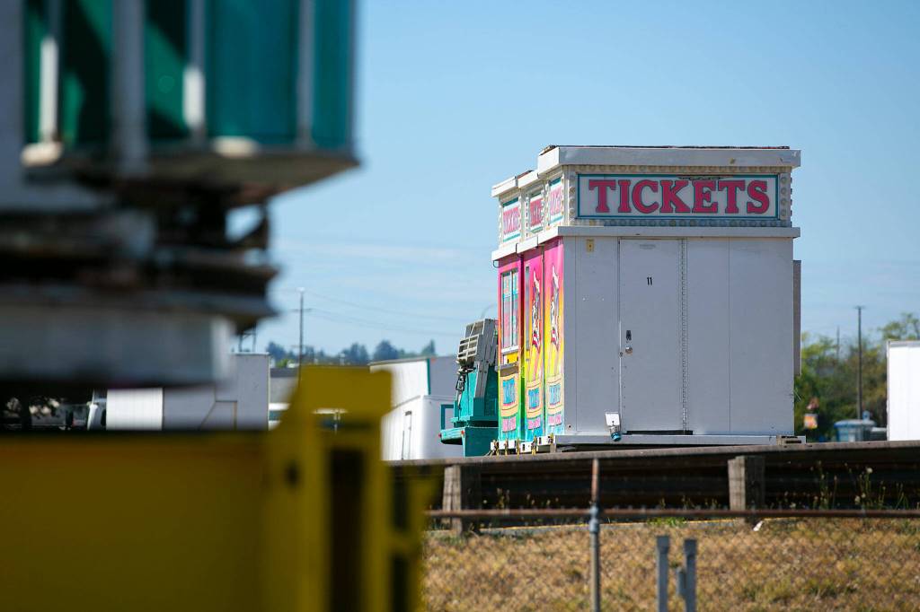Ticket booths sit in wait before being placed during setup on Monday, at the Evergreen State Fairgrounds in Monroe. (Ryan Berry / The Herald)
