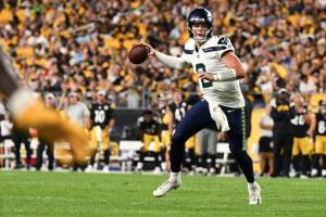 Seattle Seahawks quarterback Drew Lock (2) scrambles as he passes for a two-point conversion against the Pittsburgh Steelers during the second half of an NFL preseason football game, Saturday, Aug. 13, 2022, in Pittsburgh. (AP Photo/Barry Reeger)