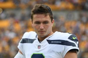 Seattle Seahawks quarterback Drew Lock (2) walks the sideline during the first half of an NFL preseason football game against the Pittsburgh Steelers, Saturday, Aug. 13, 2022, in Pittsburgh. (AP Photo/Barry Reeger)