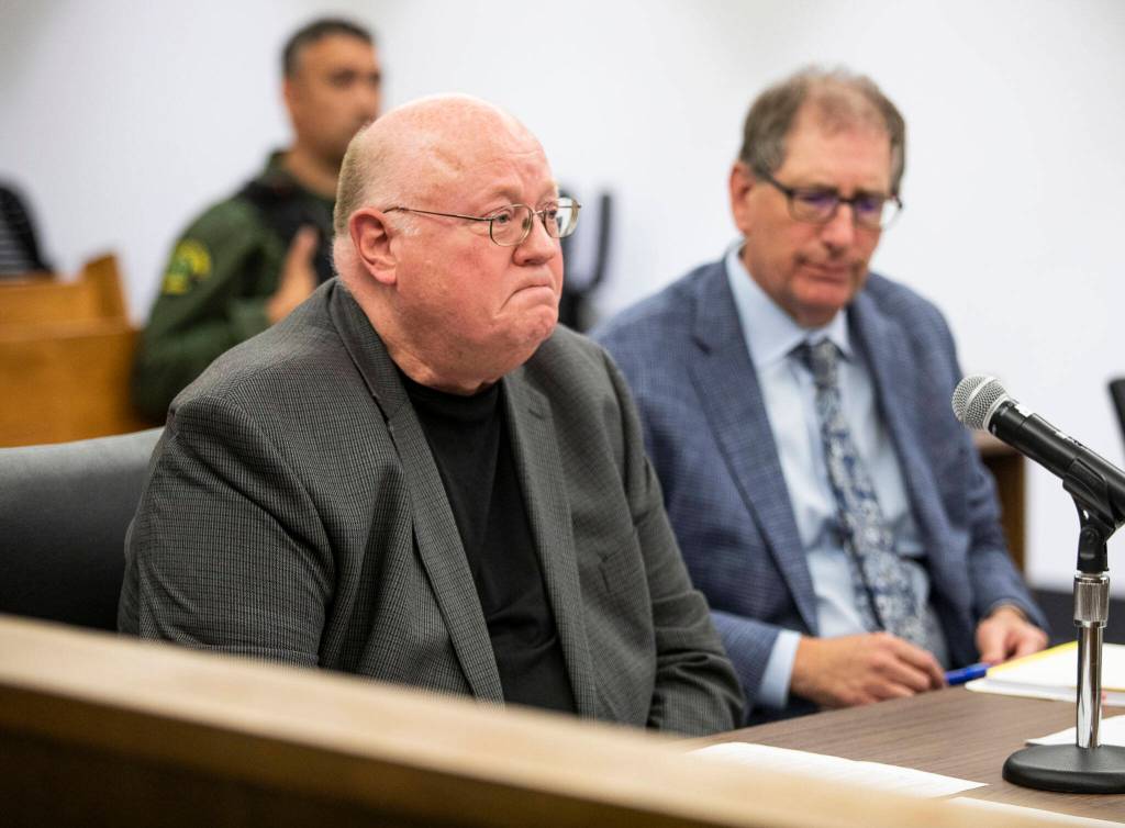 Timothy Brakke, father to Daniel Brakke, reads a statement to the court during the sentencing of Daniel Rodrigues at the Snohomish County Courthouse on Wednesday, in Everett. (Olivia Vanni / The Herald)