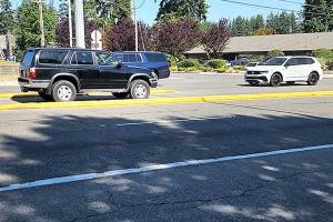 Crews painted lane and median stripes this summer on a stretch of Highway 99 between Everett and Lynnwood, but in some places the median was the wrong color, like the yellow seen here. Eventually it was repainted the correct white. (Erik Robins)