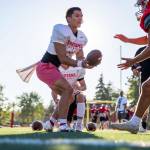 Stanwoods Wyatt Custer works on handoffs during practice Monday, Aug. 29, 2022 in Stanwood. (Olivia Vanni / The Herald)