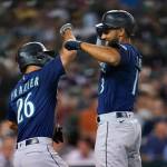 Seattle Mariners' Abraham Toro, right, celebrates his two-run home run with Adam Frazier (26) in the seventh inning of a baseball game against the Detroit Tigers in Detroit, Wednesday, Aug. 31, 2022. (AP Photo/Paul Sancya)