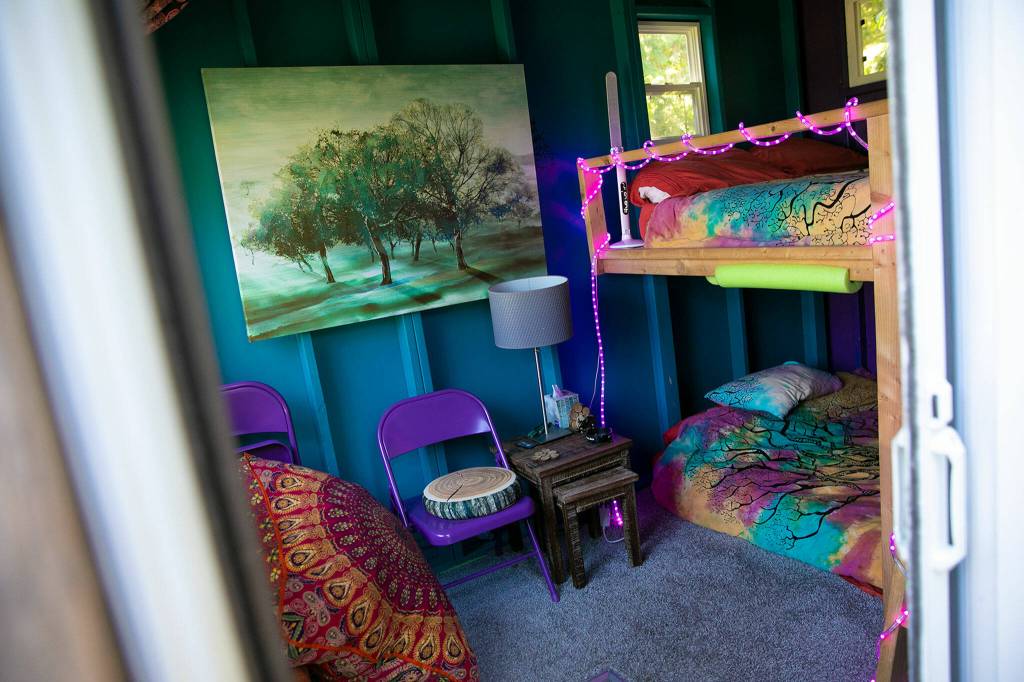 Pops of color brighten a room at the treehouse BB. (Ryan Berry / The Herald)
