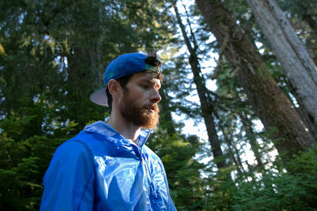 Greg Nance walks through the woods below Mount Pilchuck while reflecting on his path to sobriety on Tuesday, at the Mount Pilchuck Trailhead near Verlot. (Ryan Berry / The Herald)
