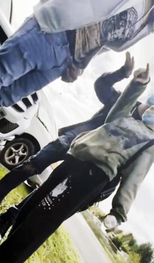 This screenshot from a Nov. 10, 2021 video shows a white student repeatedly using racial slurs in a confrontation with a Black student. (Facebook)