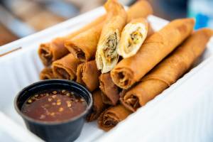 Wrap ’n’ Roll’s Lumpia at the Monroe Farmers Market on Wednesday, Aug. 31, 2022 in Monroe, Washington. (Olivia Vanni / The Herald)