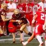 Lakewoods Bakary Sonco plows forward for extra yards on a reception against Stanwood on Friday, Sep. 2, 2022, at Lakewood High School in Arlington, Washington. (Ryan Berry / The Herald)