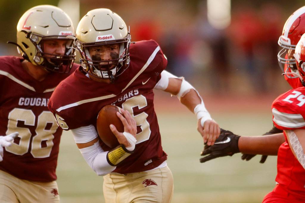 Lakewoods Jackson Lovell gets past the first line of defenders against Stanwood on Friday, Sep. 2, 2022, at Lakewood High School in Arlington, Washington. (Ryan Berry / The Herald)