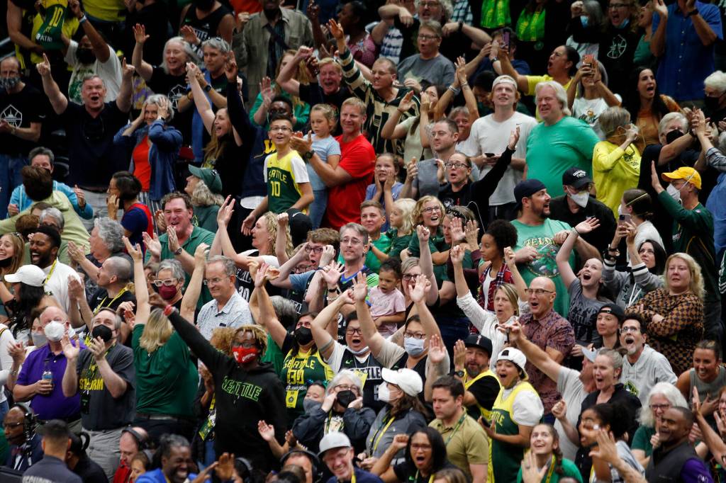 Seattle Storm fans go wild after Sue Birds late heroics during a WNBA playoff game against the Las Vegas Aces on Sunday, Sep. 4, 2022, at Climate Pledge Arena in Seattle, Washington. (Ryan Berry / The Herald)