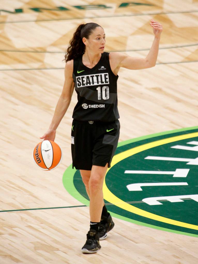 The Seattle Storms Sue Bird calls out a play while dribbling up the court during a WNBA playoff game against the Las Vegas Aces on Sunday, Sep. 4, 2022, at Climate Pledge Arena in Seattle, Washington. (Ryan Berry / The Herald)