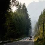 Cars drive along a smokey Mountain Loop Highway on Friday, Sept. 9, 2022 in Granite Falls, Washington. (Olivia Vanni / The Herald)