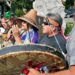 Members of the Tulalip Tribes on Friday perform a blessing and acknowledgment at the dedication of the replacement bronze plaque for the 1855 treaty between local tribes and the U.S. government in Mukilteo. (Kevin Clark / The Herald)