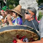Members of the Tulalip Tribes perform a blessing and acknowledgement at the dedication of the replacement bronze plaque for the 1855 treaty between local tribes and the U.S. government in Mukilteo, Washington on September 9, 2022. (Kevin Clark / The Herald)