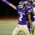 Lake Stevens Steven Lee Jr. signals a change of possession after his defense stopped Bellevue on 4th down Friday, Sep. 9, 2022, at Lake Stevens High School in Lake Stevens, Washington. (Ryan Berry / The Herald)