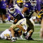 Lake Stevens Jayden Limar spins away from a would-be tackler against Bellevue on Friday, Sep. 9, 2022, at Lake Stevens High School in Lake Stevens, Washington. (Ryan Berry / The Herald)