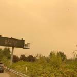 Thick wildfire smoke from the Bolt Creek fire turned skies orange Saturday, Sept. 10, 2022, along U.S. 2 near Gold Bar. (Courtesy Washington State Patrol Trooper Jacob Kennett)