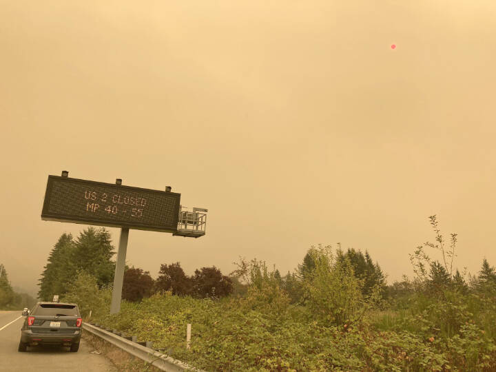 Thick wildfire smoke from the Bolt Creek fire turned skies orange Saturday, Sept. 10, 2022, along U.S. 2 near Gold Bar. (Courtesy Washington State Patrol Trooper Jacob Kennett)