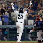 Seattle Mariners' Eugenio Suarez celebrates his solo home run on a pitch from Atlanta Braves starting pitcher Max Fried during the sixth inning a baseball game, Saturday, Sept. 10, 2022, in Seattle. (AP Photo/John Froschauer)