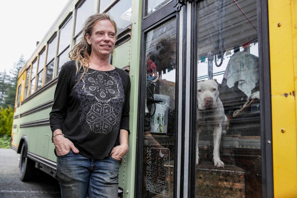 Sarah Jay Knauss evacuated from her home in Index due to the Bolt Creek fire and is currently camping in the parking lot of Gold Bar Family Grocer. Photographed in Gold Bar on Monday. (Kevin Clark / The Herald)