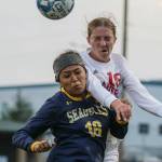Everetts Andrea Parrish, left, and Snohomishs Brianna Ulrich jump to compete for a header Tuesday evening in Everett, Washington on September 13, 2022. The Panthers defeated the Eagles 3-1. (Kevin Clark / The Herald)