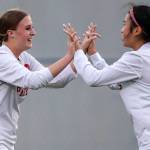 Snohomish's Sara Rodgers, left, celebrates her second score Mak Kunz Tuesday evening in Everett, Washington on September 13, 2022. The Panthers defeated the Eagles 3-1. (Kevin Clark / The Herald)