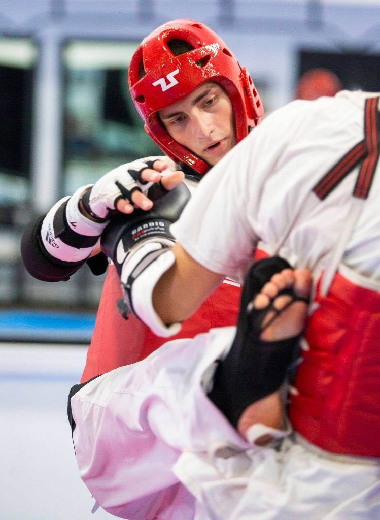 Peter Sokolenko runs through warm up exercises at Master JI’s TaeKwonDo Martial Arts School on Thursday, Sept. 8, 2022 in Monroe, Washington. (Olivia Vanni / The Herald)