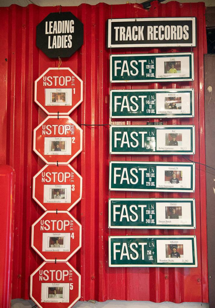 Track records are posted on the wall at Traxx Indoor Raceway. (Ryan Berry / The Herald)