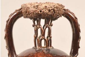 Puzzle jugs provided a drinking game for centuries. Do you think you could drink from one without spilling?