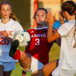 Cameron Bourne (center) and the defending 2A state champion Wildcats are coming off a rare perfect season. (Kevin Clark / The Herald)