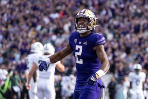 Washington Washington wide receiever Ja'Lynn Polk celebrates after scoring a touchdown against Michigan State during the first half of an NCAA college football game, Saturday, Sept. 17, 2022, in Seattle. (AP Photo/Stephen Brashear)