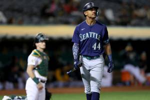 Seattle Mariners' Julio Rodriguez (44) walks back to the dugout after striking out against the Oakland Athletics during the fifth inning of a baseball game in Oakland, Calif., Tuesday, Sept. 20, 2022. (AP Photo/Jed Jacobsohn)