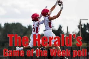 Marysville-Pilchuck’s Darren Johnson-Jones, left, tries to block a pass to Miguel Chavez, right, during football practice on Thursday, Aug. 19, 2021 in Marysville, Wash. (Olivia Vanni / The Herald)