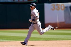 Seattle Mariners' Jarred Kelenic rounds the bases after hitting a home run during the fourth inning of a baseball game against the Oakland Athletics in Oakland, Calif., Thursday, Sept. 22, 2022. (AP Photo/Jeff Chiu)