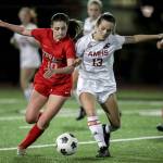 Mountlake Terraces Ally Villalobos Van Slooten, left, and Archbishop Murphys Cameron Bourne race to control the ball Thursday night at Lynnwood High School in Lynnwood, Washington on September 22, 2022. The Hawks and Wildcats finished the match with 1-1 tie. (Kevin Clark / The Herald)