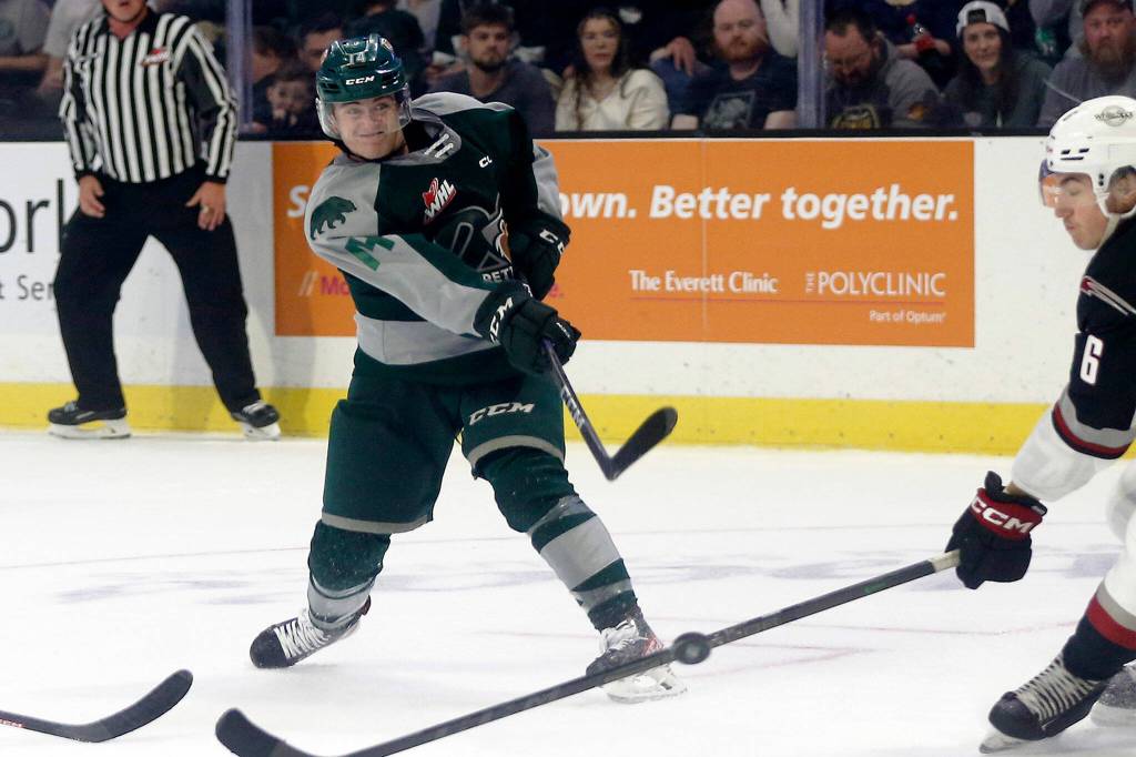 Everett Silvertips Austin Roest wrists a shot to the goal during the season opener against the Vancouver Giants on Saturday, Sep. 24, 2022, at Angel of the Winds Arena in Everett, Washington. (Ryan Berry / The Herald)