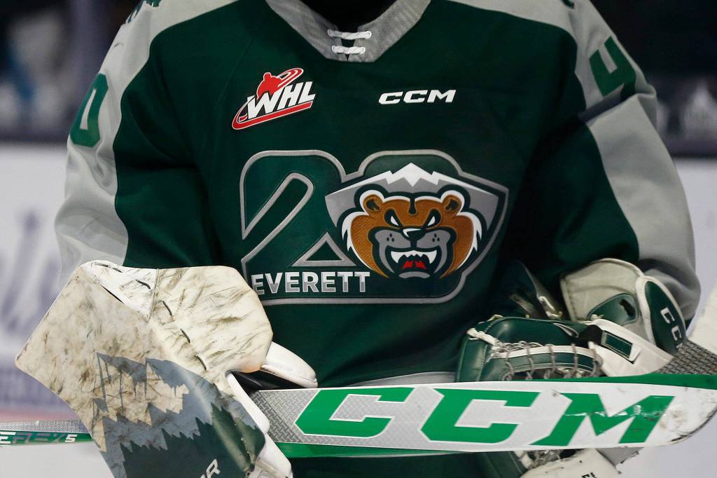 The Everett Silvertips 20th anniversary logo is seen on goalie Braden Holts sweater during the season opener against the Vancouver Giants on Saturday, Sep. 24, 2022, at Angel of the Winds Arena in Everett, Washington. (Ryan Berry / The Herald)